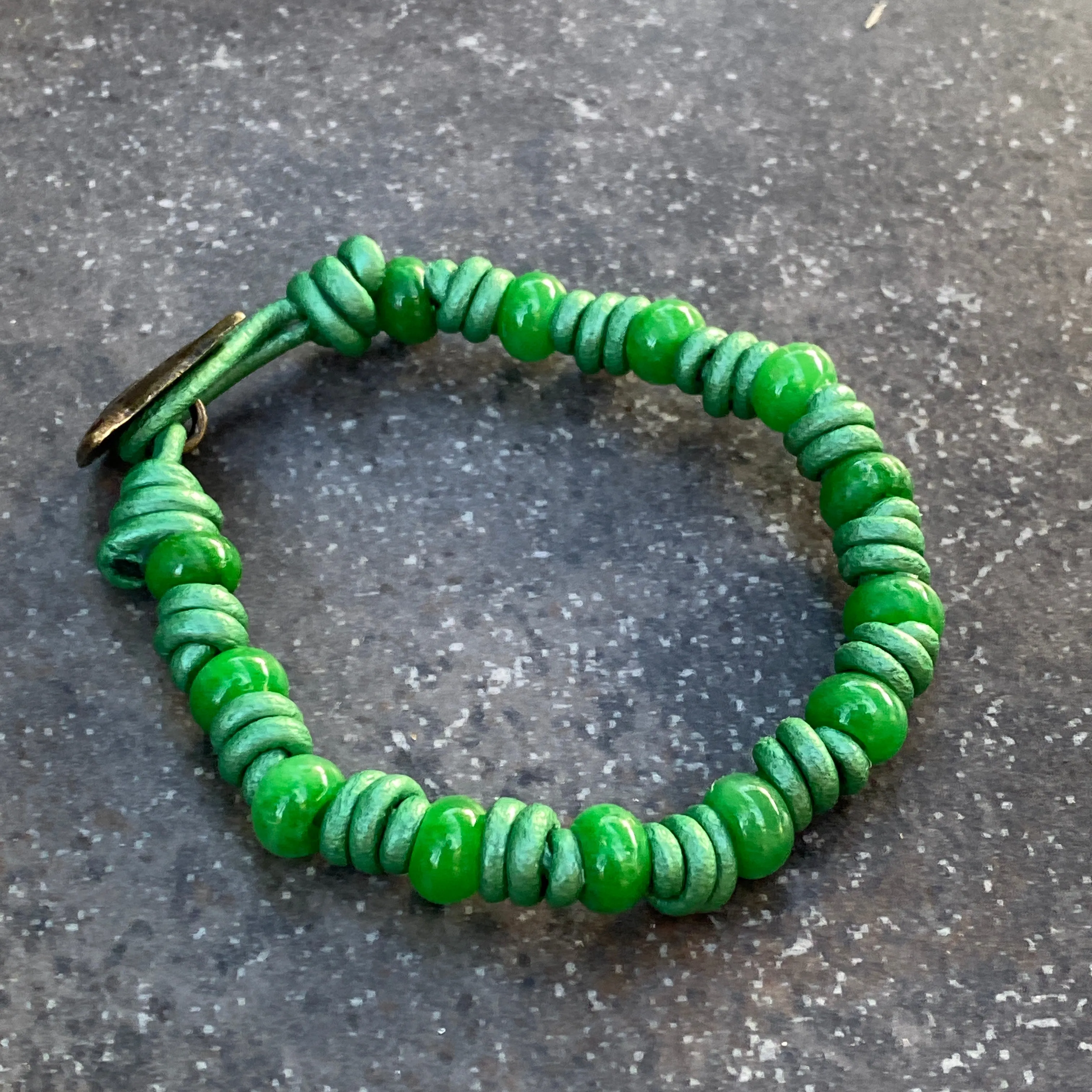 Hand knotted Jade gemstone on green Leather Bracelet