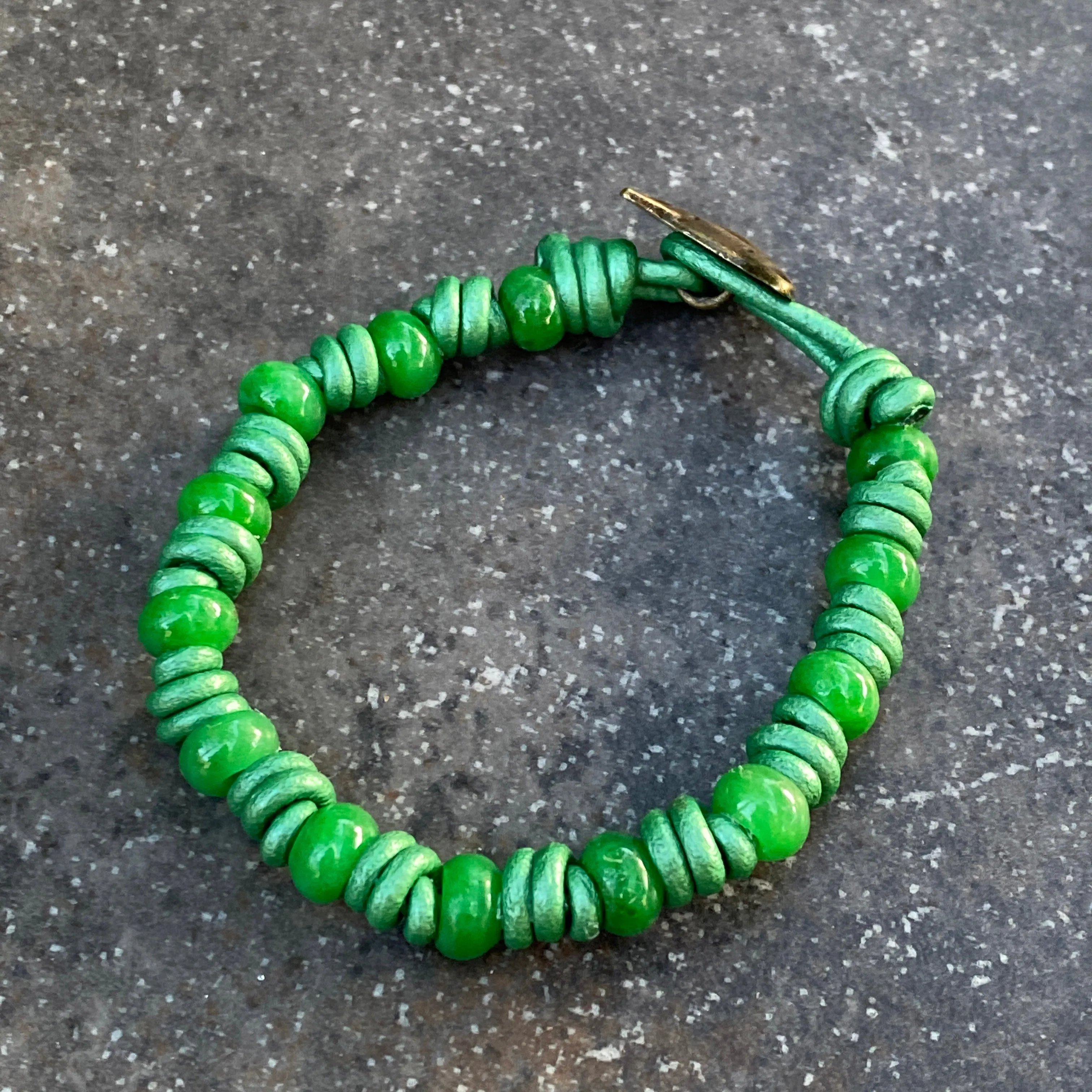 Hand knotted Jade gemstone on green Leather Bracelet